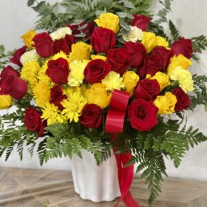Red, Yellow Roses With Greens arrangement